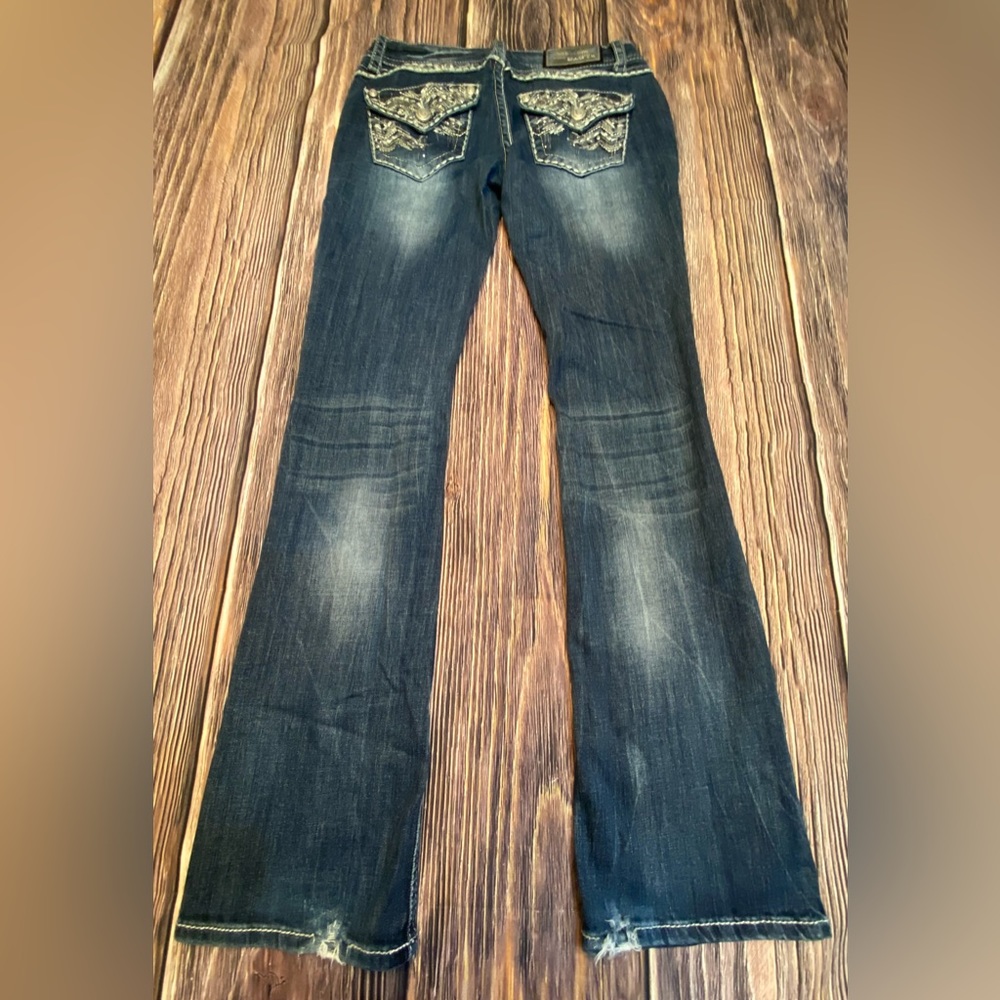 Grace in LA Size 28 bootcut. Stone(s) missing on pocket. Frayed, damaged hems.